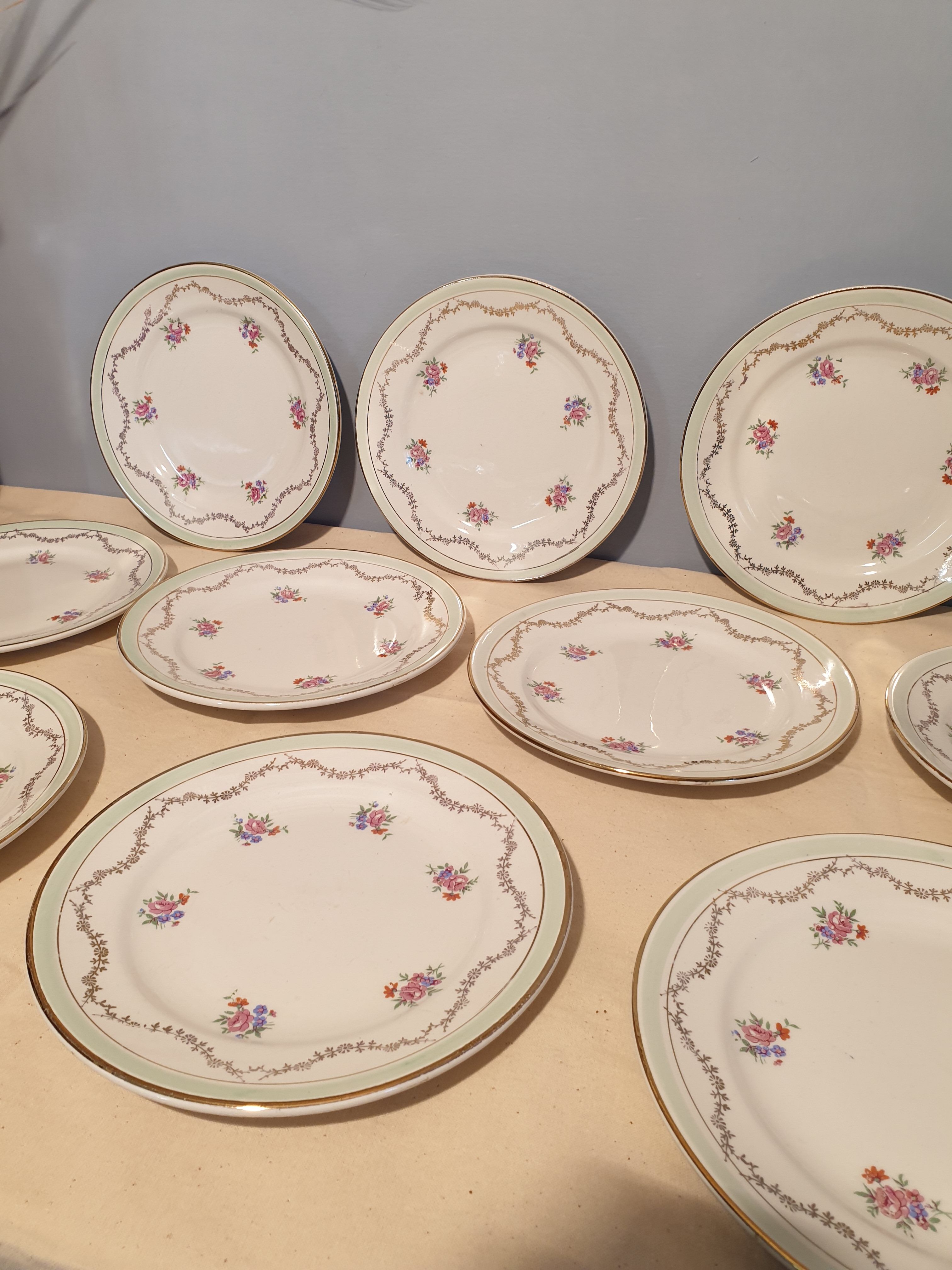 Suite of 11 St Amandinoise dessert plates