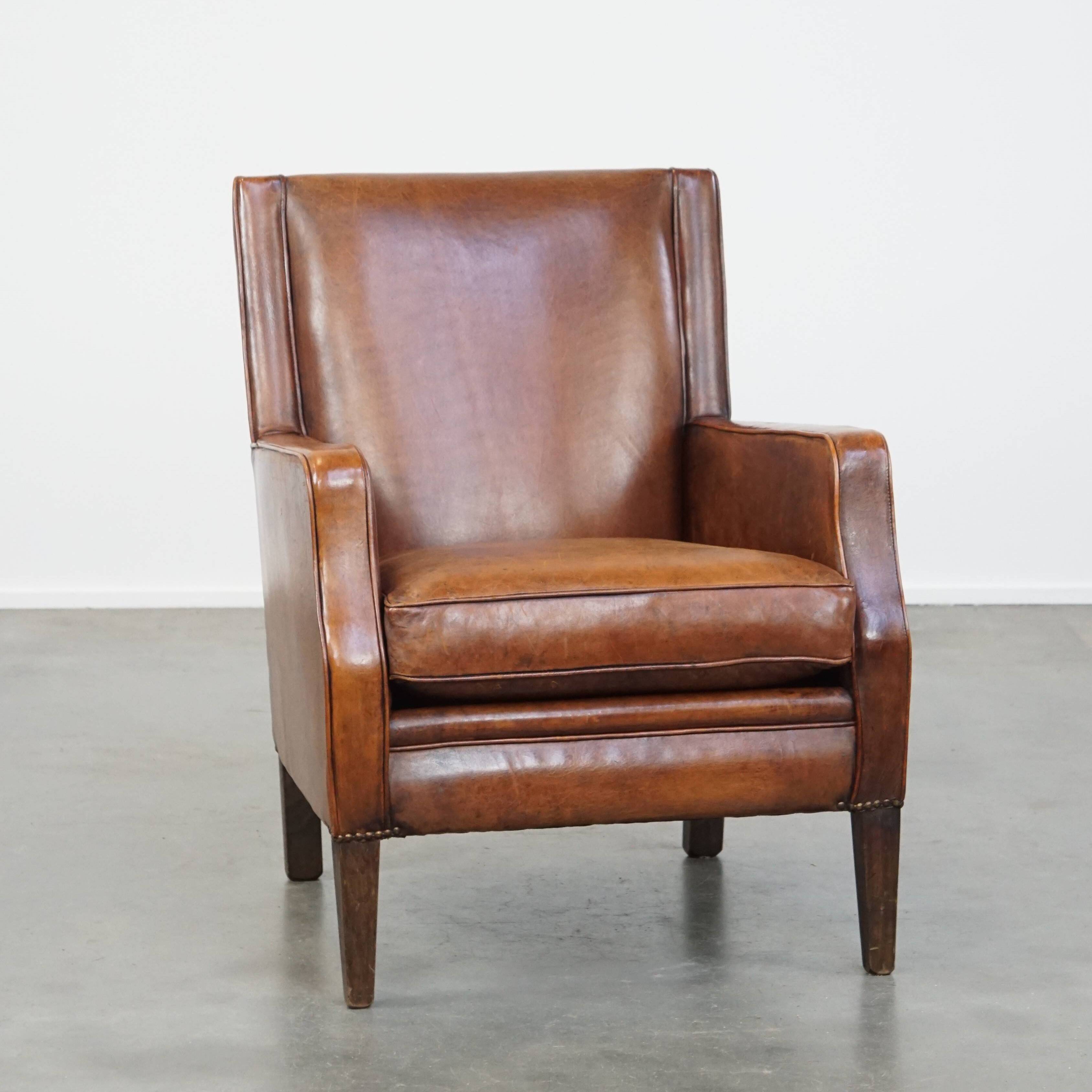 Sheepskin armchair with a refined Art Deco design