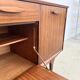 Teak Jentique sideboard — 1 door, 2 drawers & drop-down bar, England 1950s-60s
