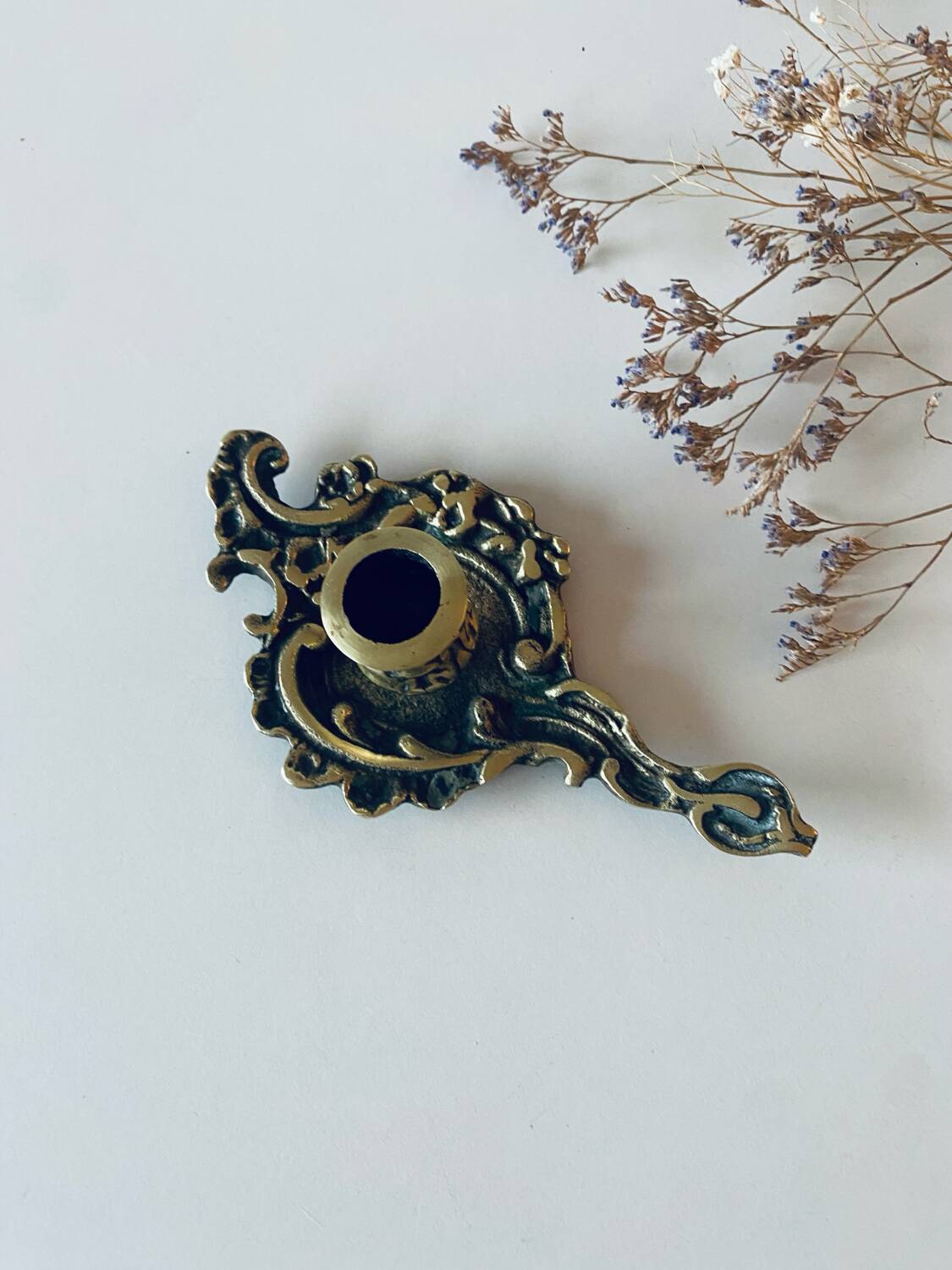 Antique bronze candle holder