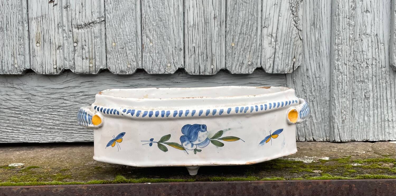 Rouen earthenware planter/cooler with flowers and foliage, 18th century