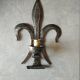 Brutalist iron wall light "fleur de lys"