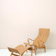 'Pernilla' armchair and footstool designed by Bruno Mathsson