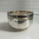 Vintage silver cup with a glass interior.