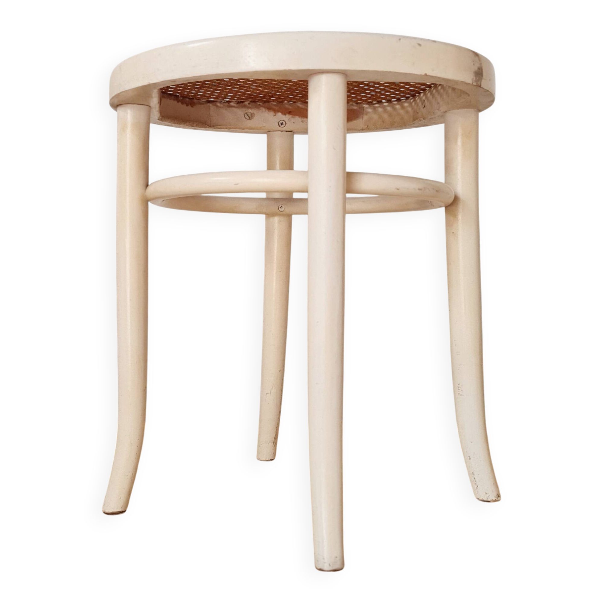 Antique stool with wood and cream caning.