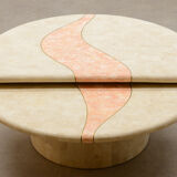 Travertine coffee table with swiveling top.