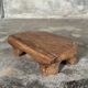Small stool, teak footrest with short cut corners.