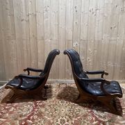 Paire de fauteuils anglais chesteefield en cuir noir