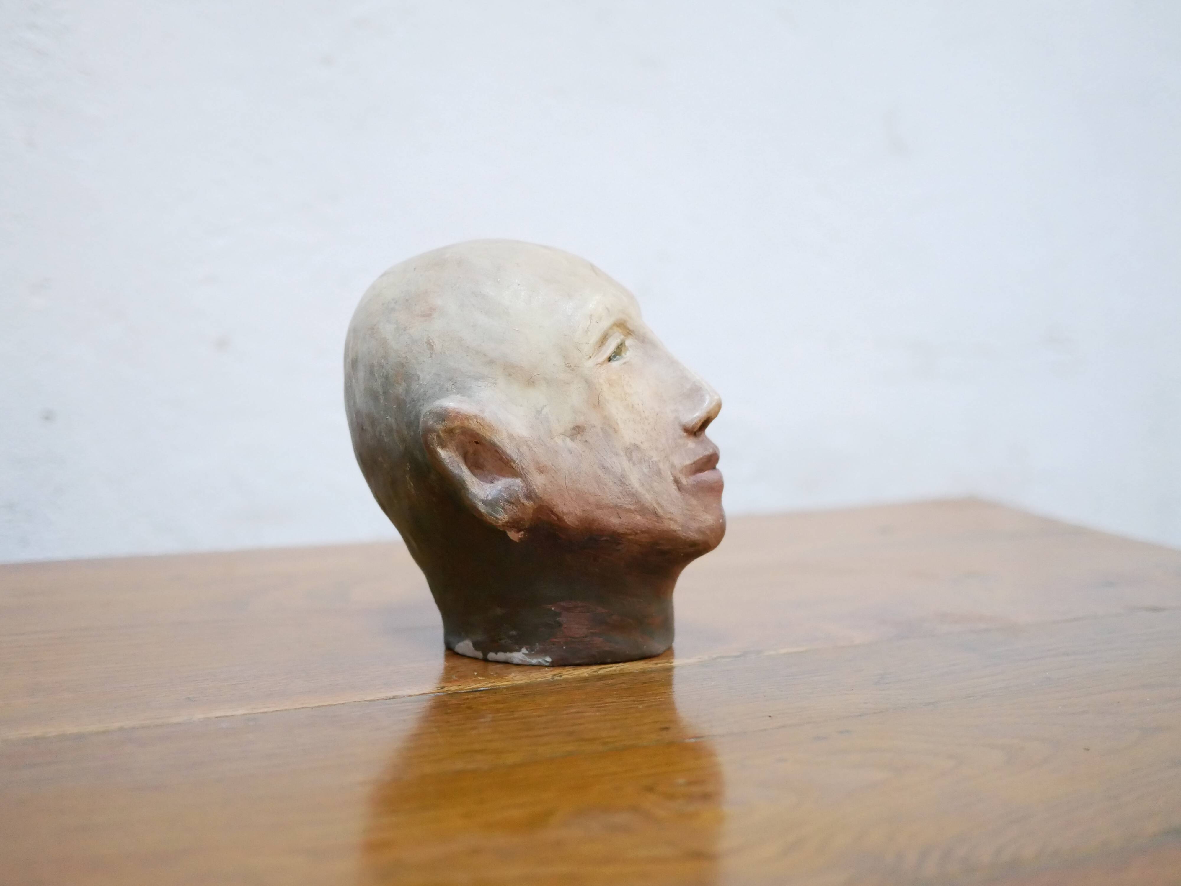 Terracotta head sculpture