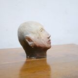 Terracotta head sculpture