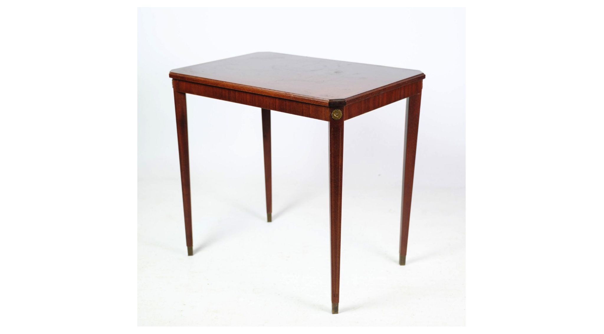 Side table decorated with bronze ornaments in light mahogany