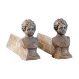 Pair of cast iron chenets, Love victorious