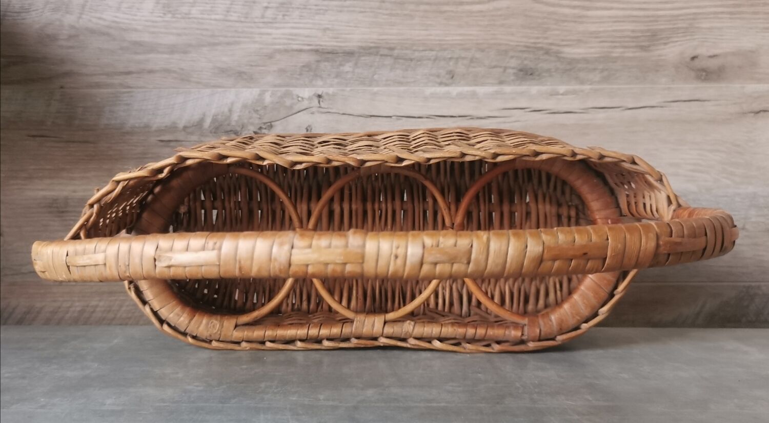 Vintage wicker bottle rack