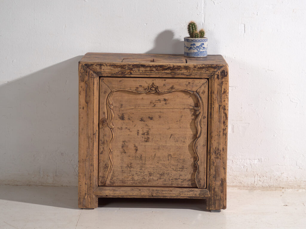 Low Shanxi cabinet in elm with carved door – China, circa 1930