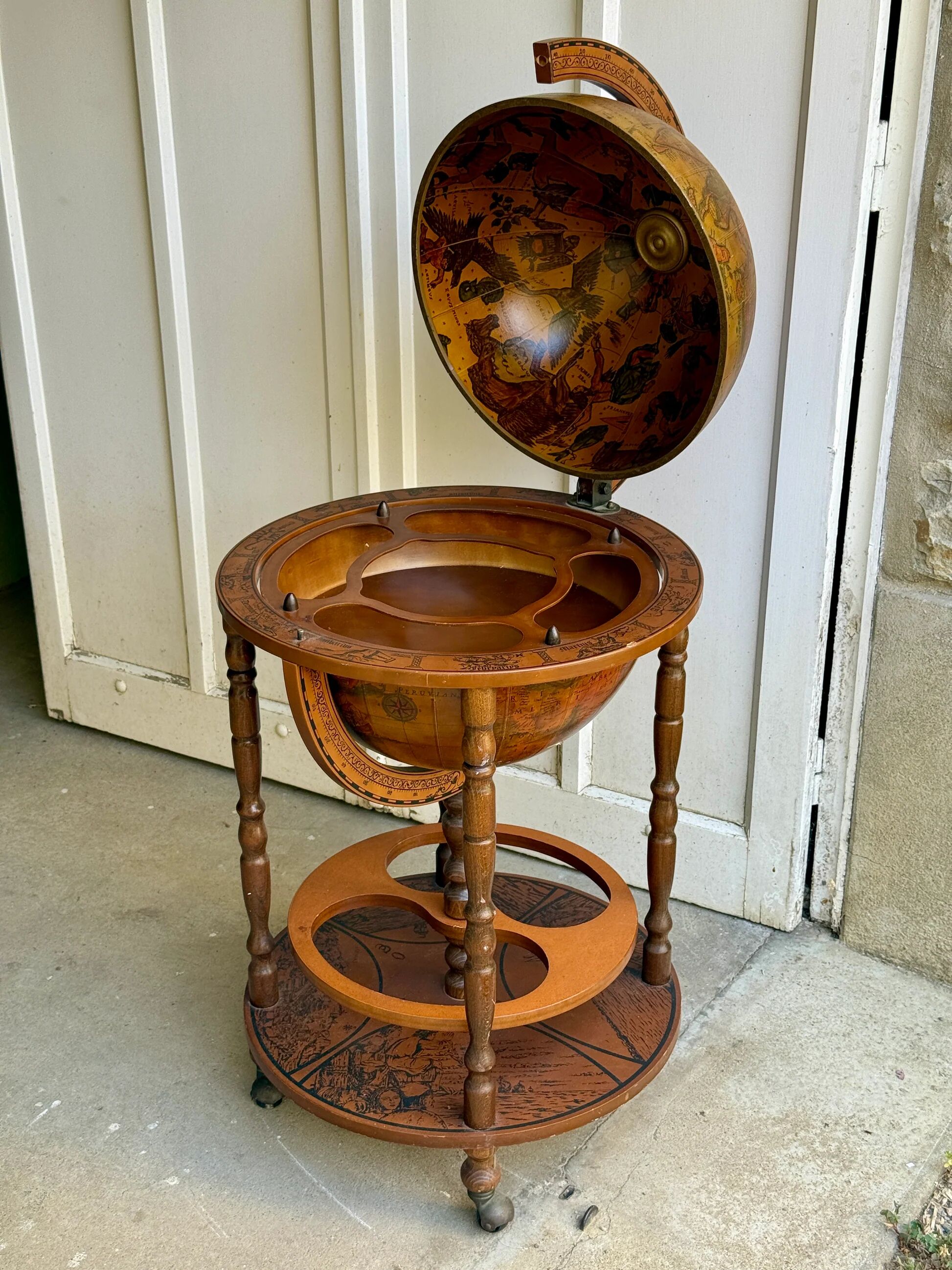 Globe bar on wheels with a rotating tray