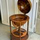 Globe bar on wheels with a rotating tray