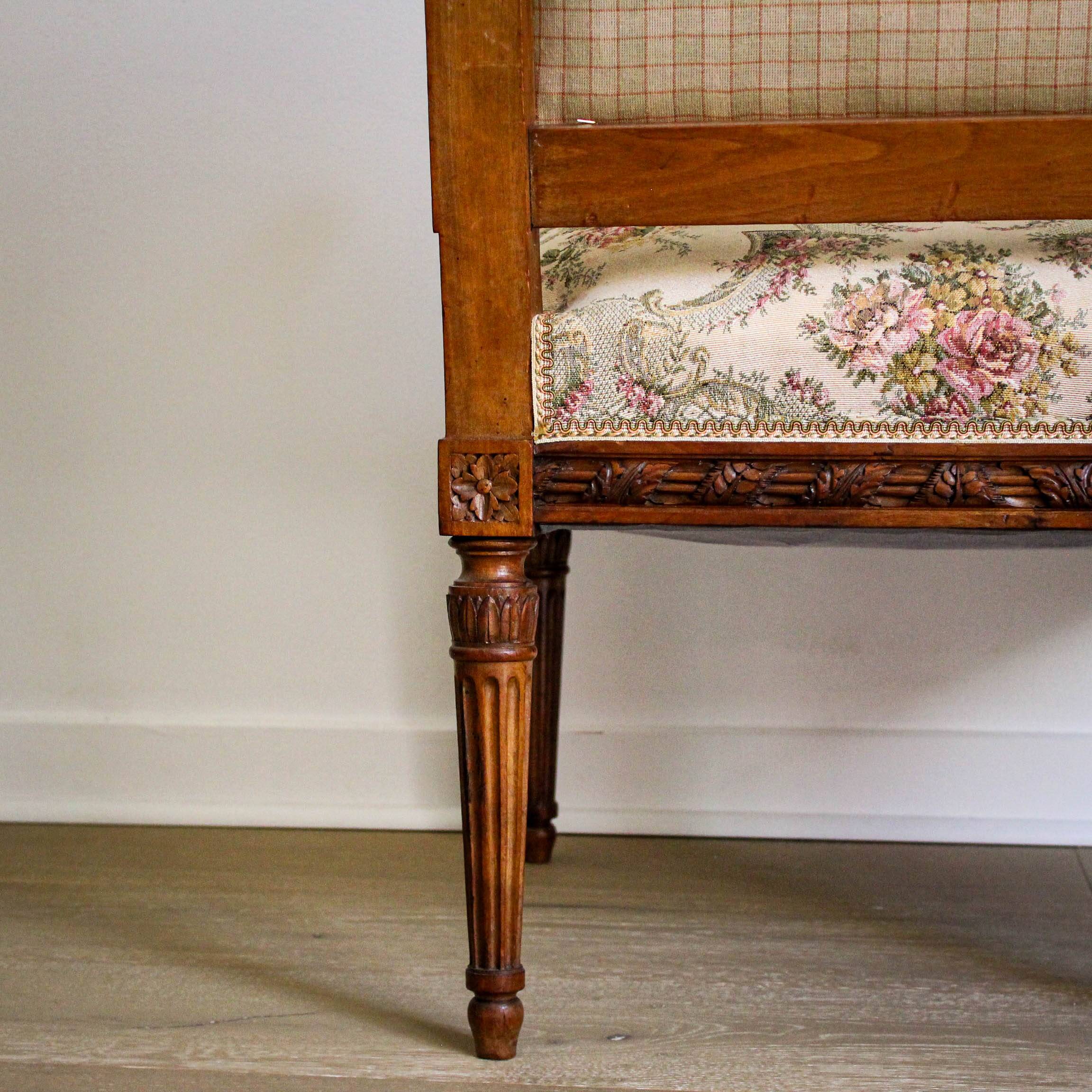 Louis XVI style carved armchair