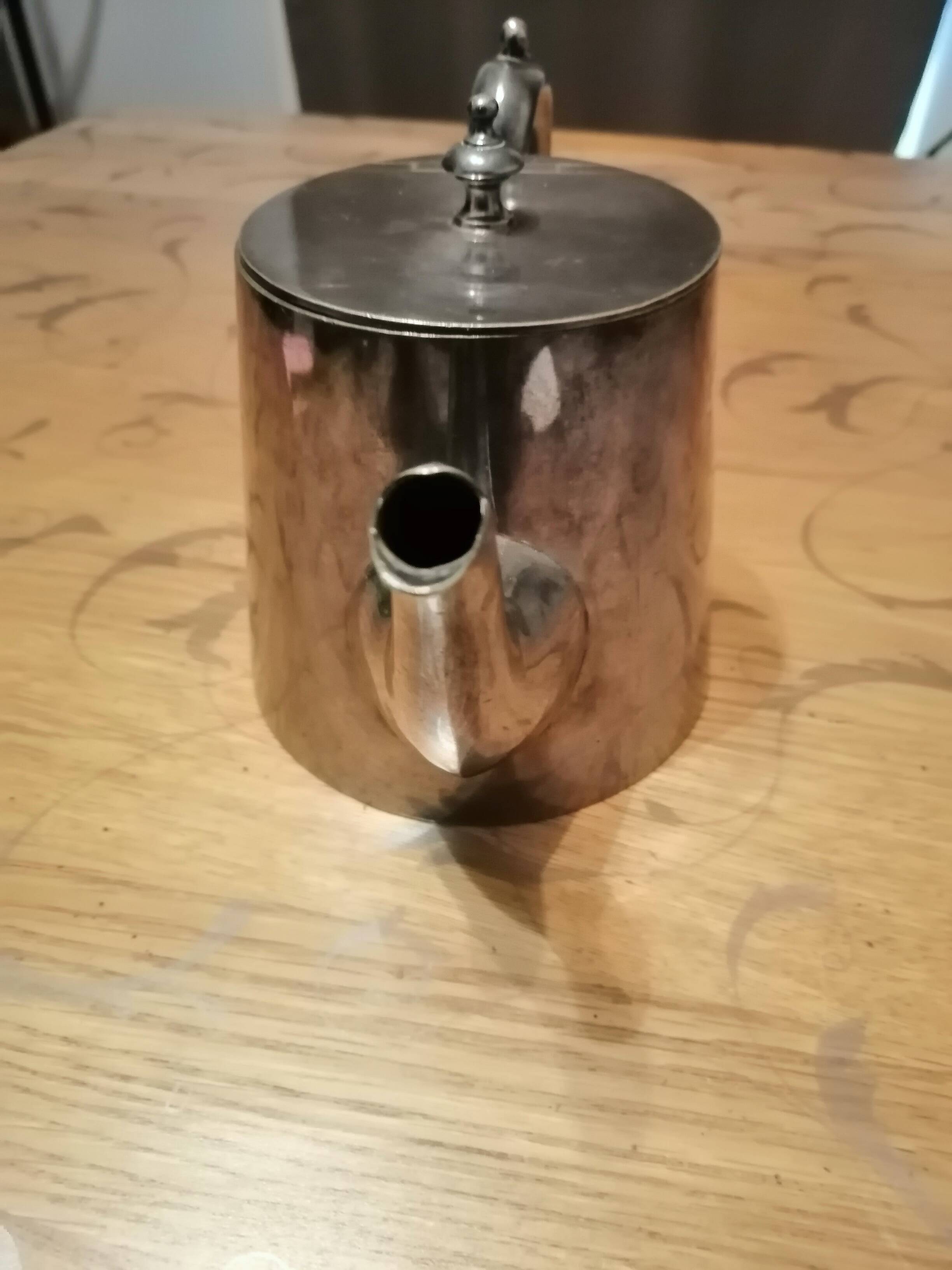 silver-plated teapot