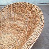 Wicker lounge chair in the style of Dirk Van Sliedregt for Rohé Noordwolde, Netherlands, 1960s.