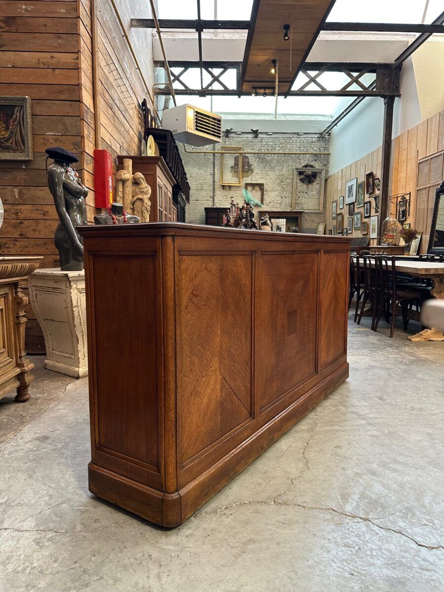 Early 20th-century oak hardware counter