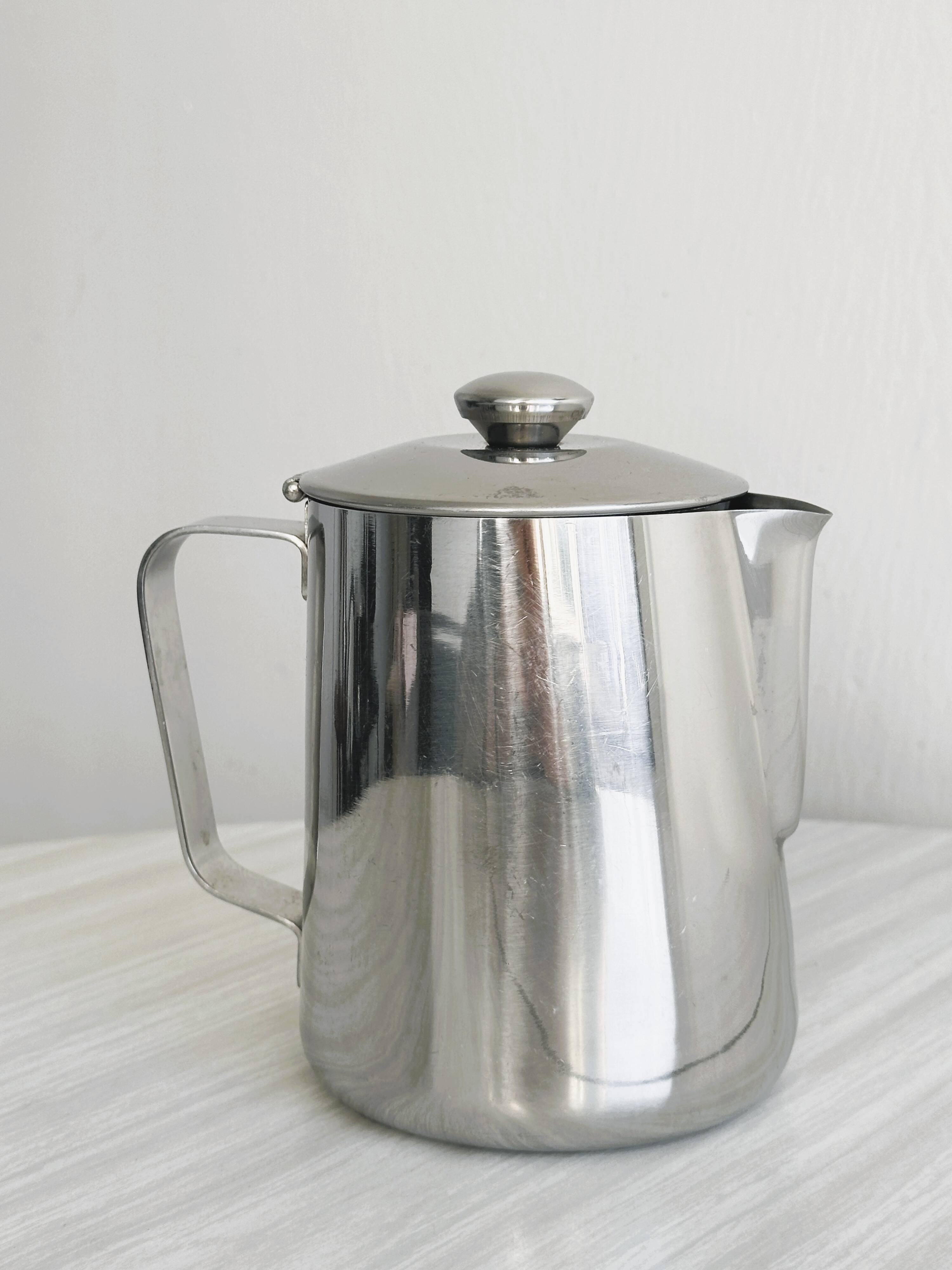 Milk jug, carafe in shiny stainless steel