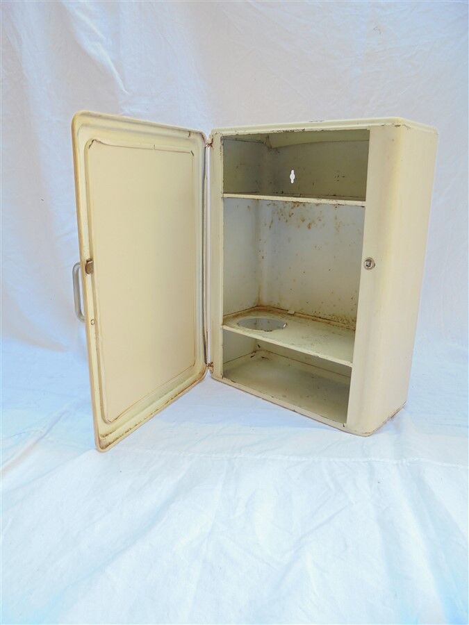 Metal pharmacy cabinet