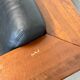 Vintage Black Leather Loveseat with Cantilevered Walnut Tray Arms