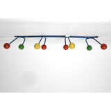Multicolored coat rack in wood and metal
