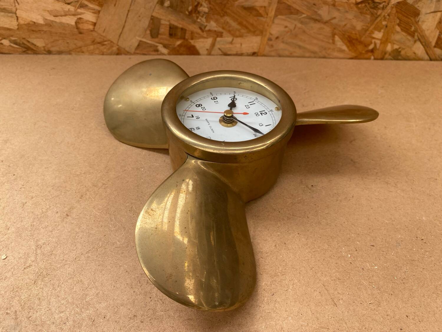 Antique brass propeller with pendulum vintage nautical wall clock