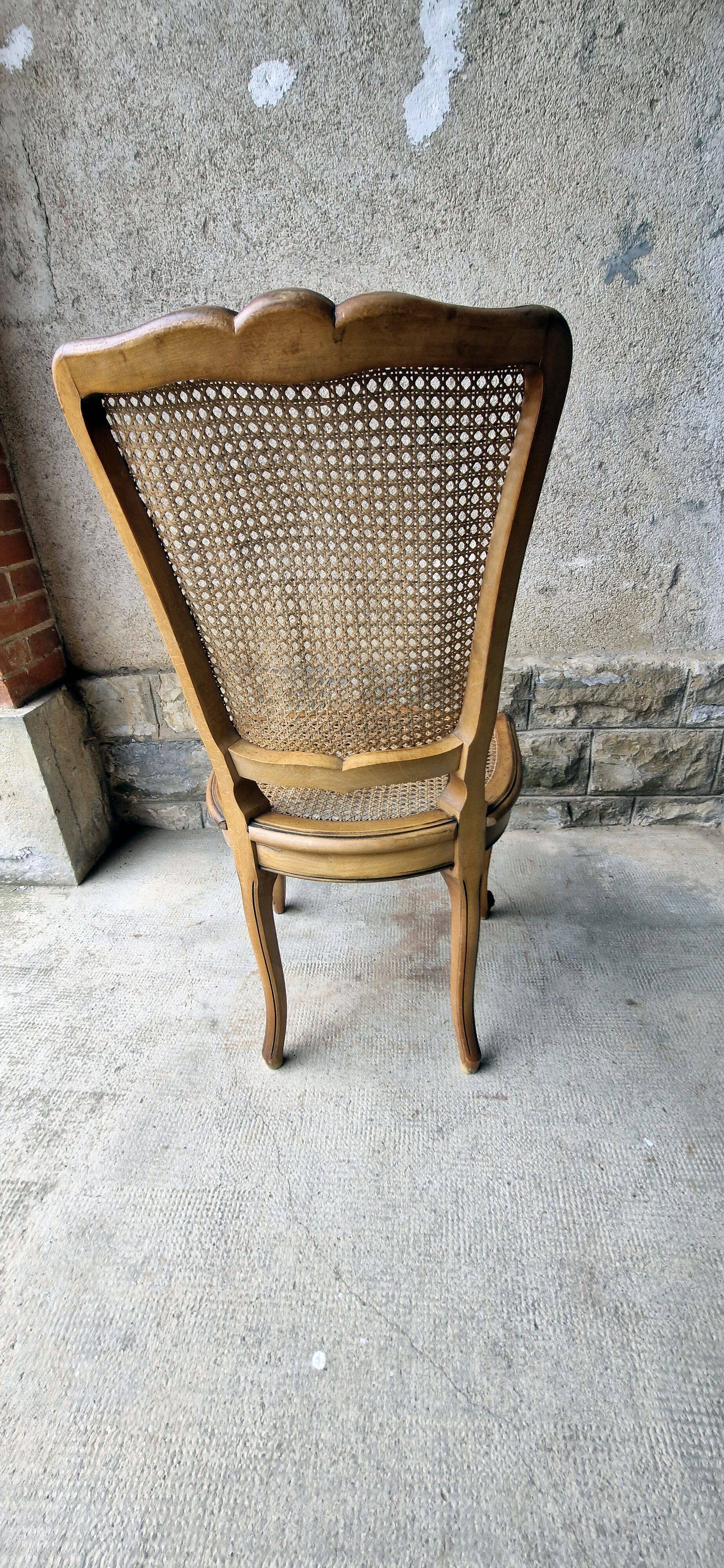 5 old cane-seated solid oak chairs.