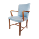 Armchair in mahogany and upholstered with light blue fabric by Fritz Hansen