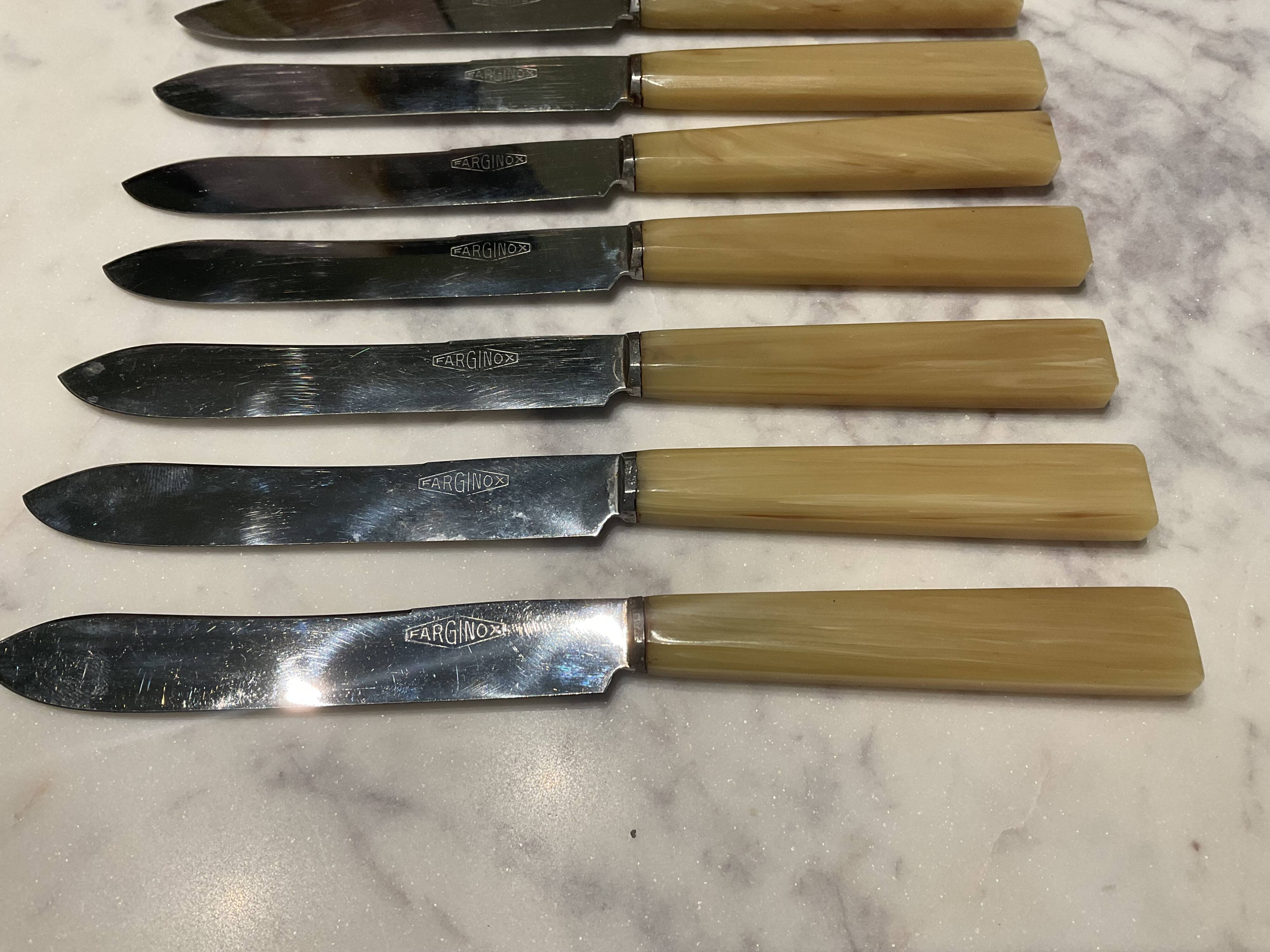 12 cheese knives. Vintage