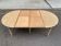 Table à manger ronde volets extensible Louis Philippe décapée en chêne brut