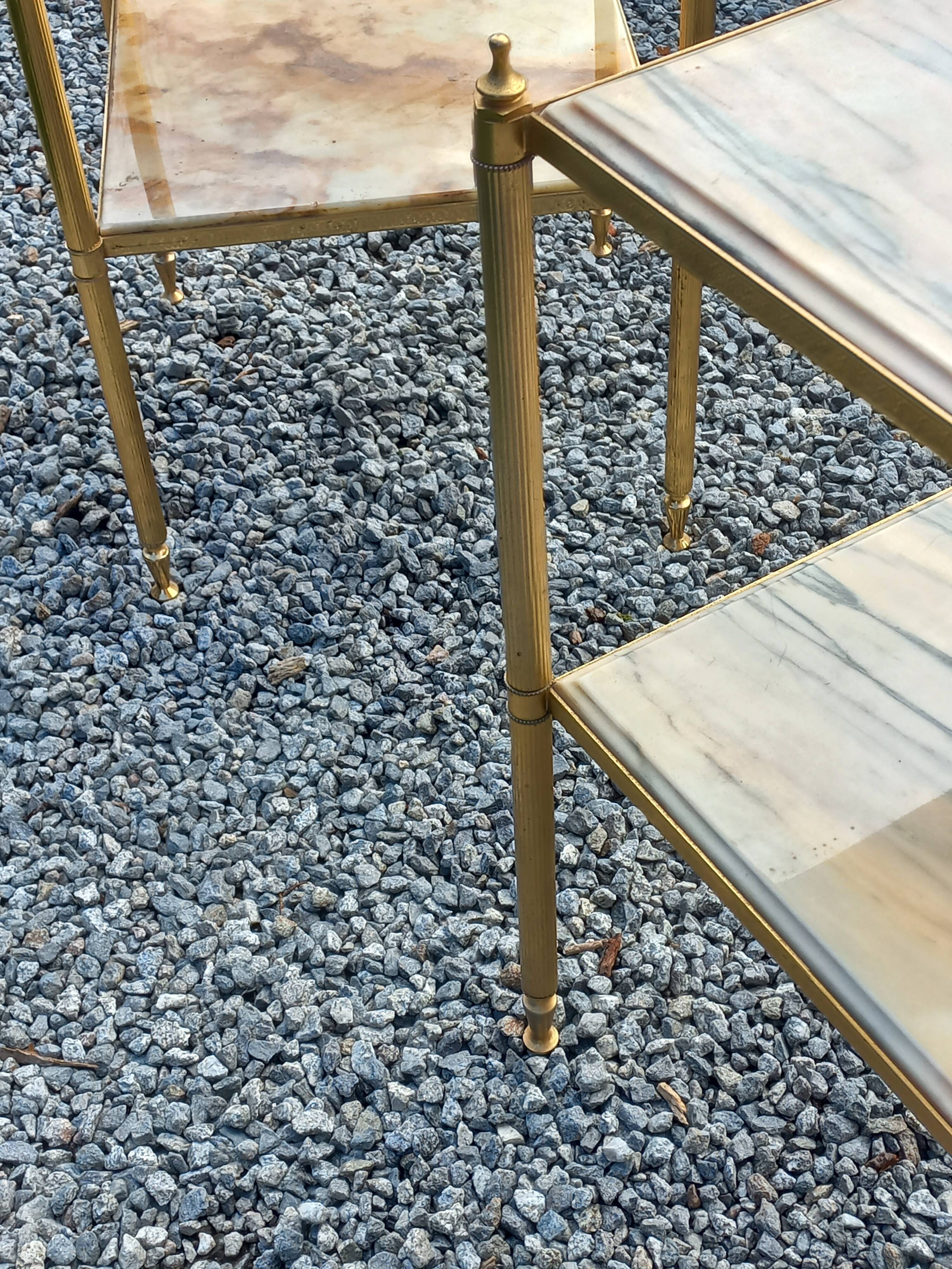 Pair of neoclassical side tables in bronze, brass, marble, and o.