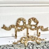 2 hooks in gilded brass