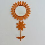 Large 1970s "flower" mirror in orange metal