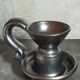 1950s iridescent black ceramic hand candle holder