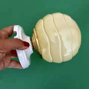 Vintage Art Deco globe wall light in pale yellow opaline.