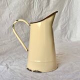 Vintage pitcher or jug in beige enamelled sheet metal