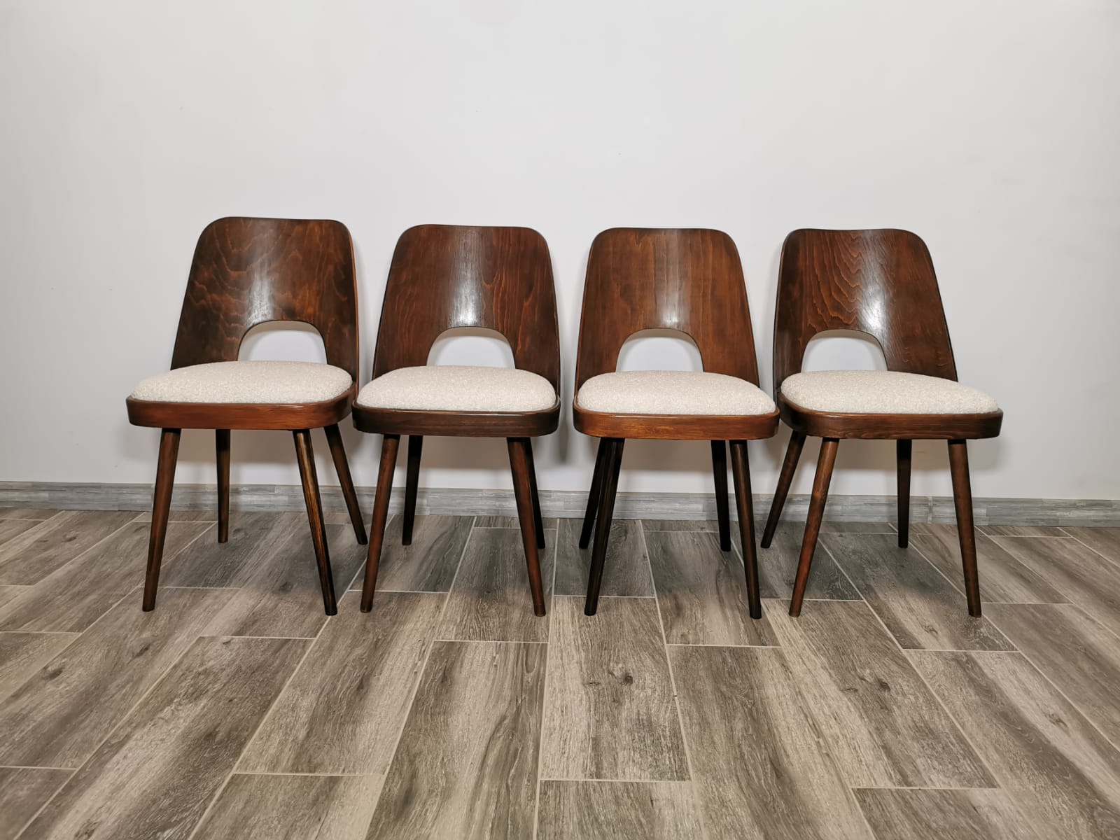 Dining chairs by Oswald Haerdtl