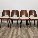 Dining chairs by Oswald Haerdtl