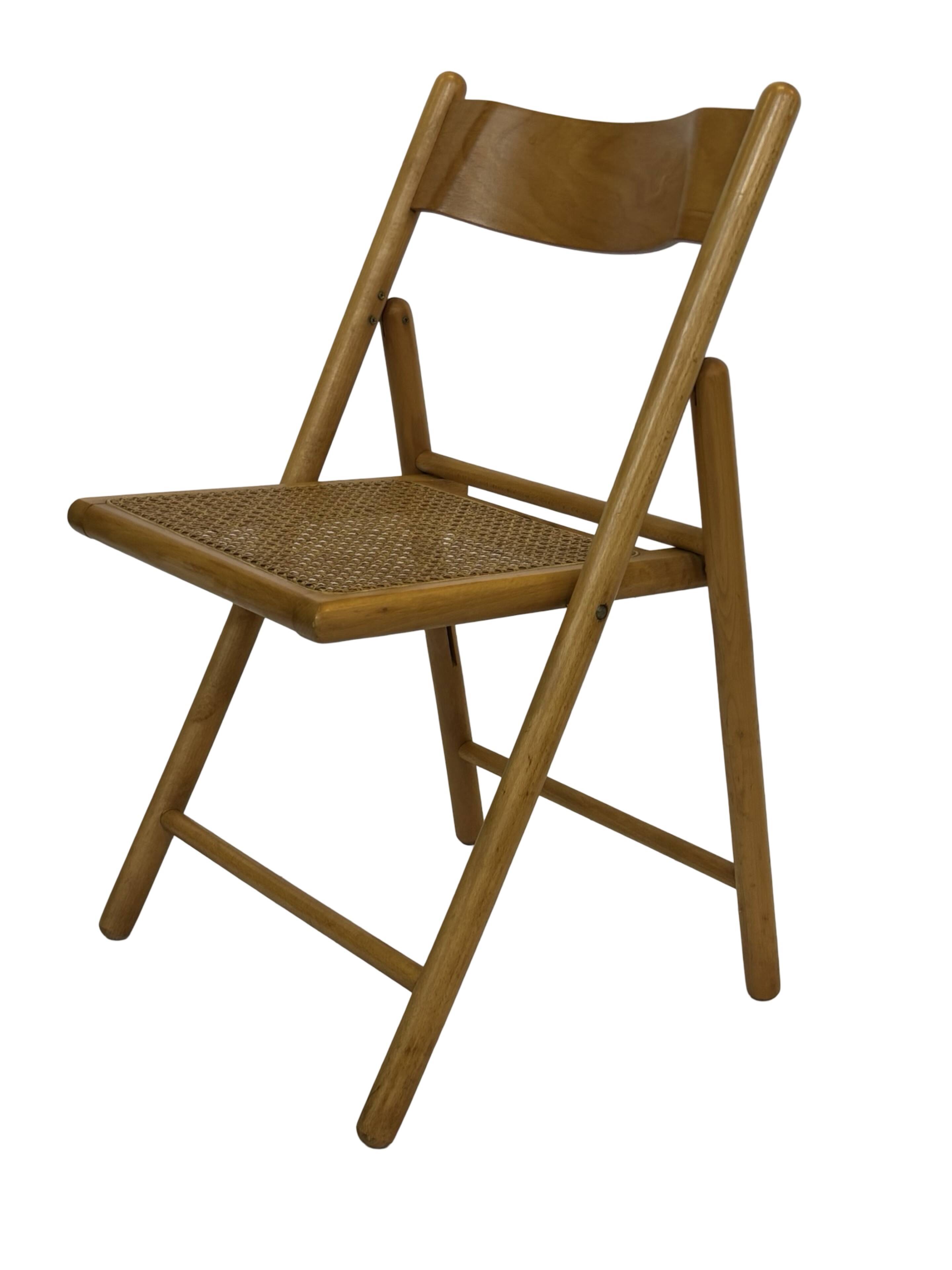 Vintage wooden folding chair with rattan seat 80s minimalist design