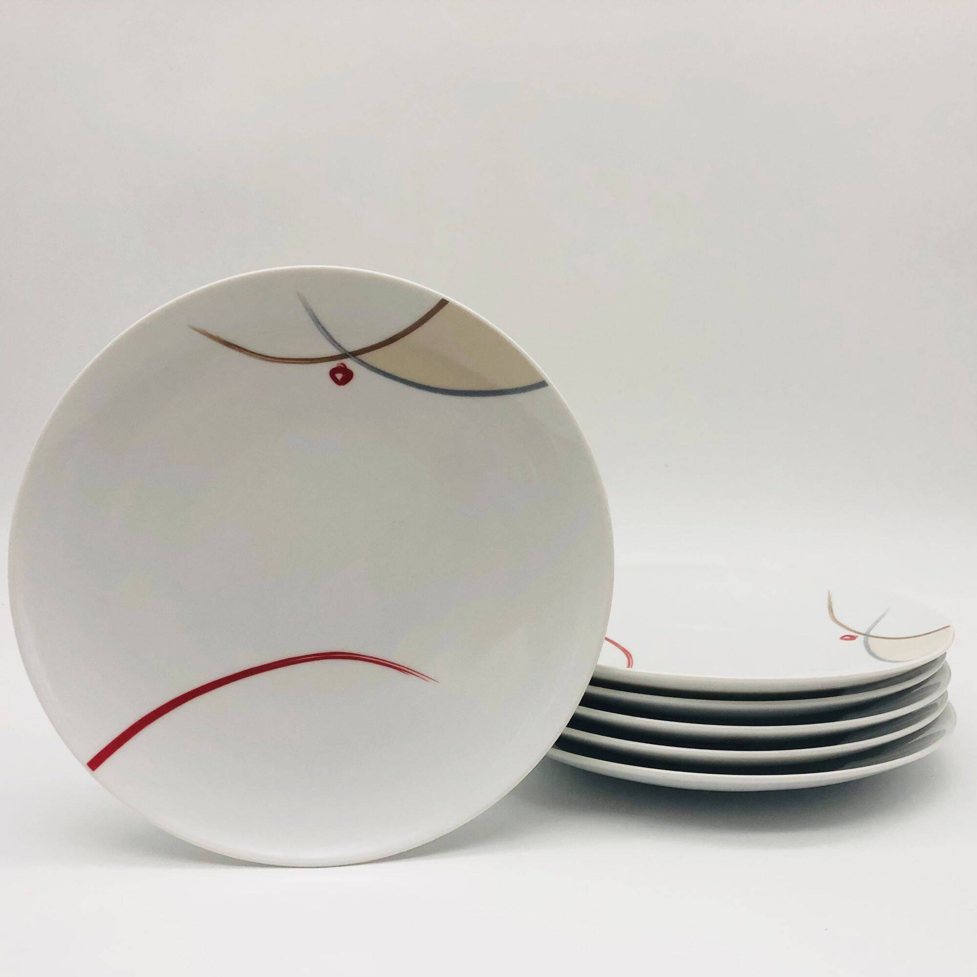 6 porcelain dessert plates. Guy Degrenne.