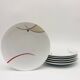 6 porcelain dessert plates. Guy Degrenne.
