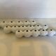 Three flower spikes caterpillar design René Barba Serax