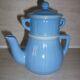 Individual coffee maker with bright blue filter
