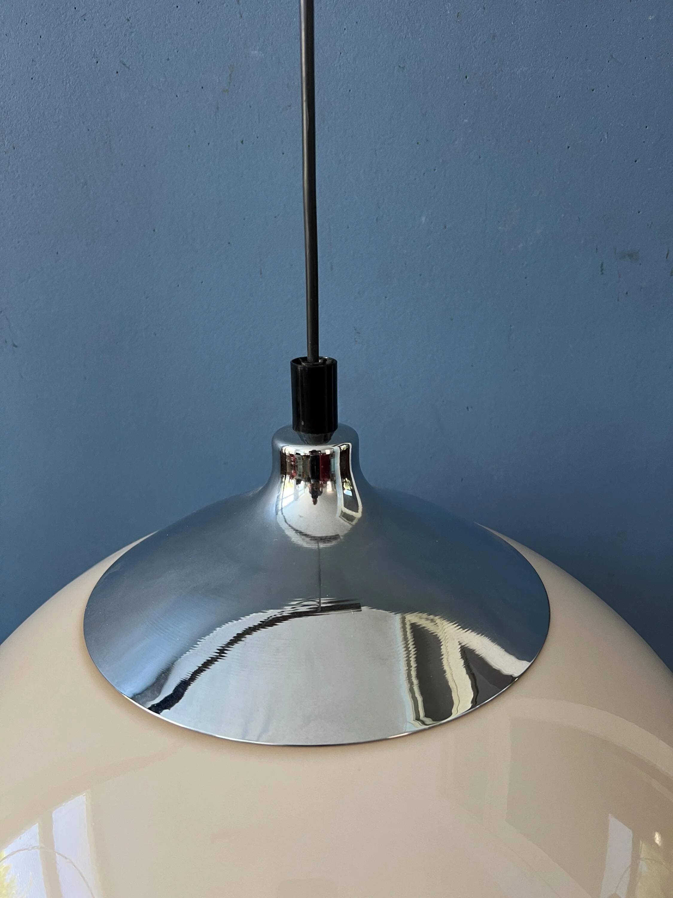 Beige acrylic glass mushroom pendant with a chrome top cap.