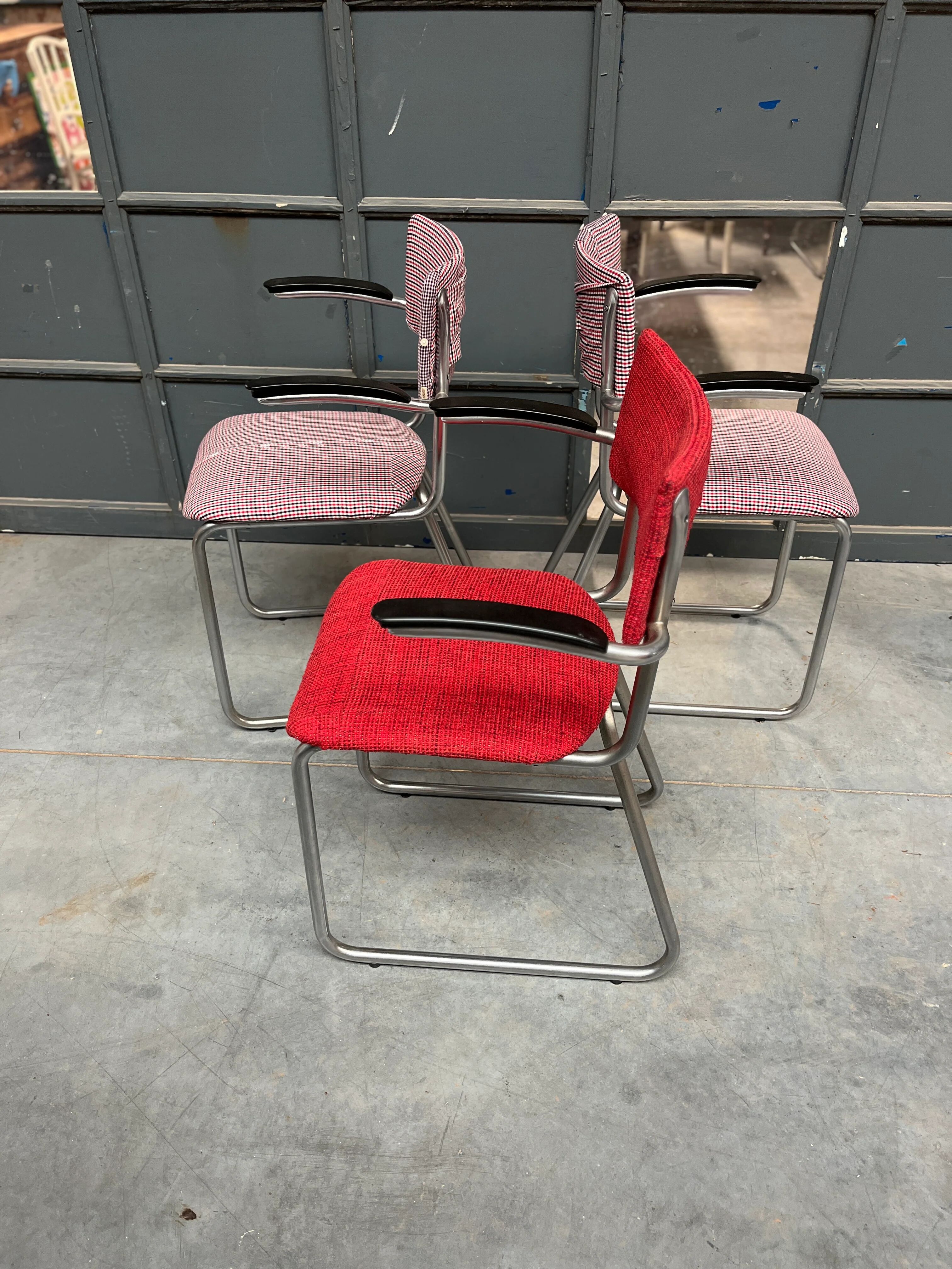 Set of 3 vintage cantilever chairs reupholstered.