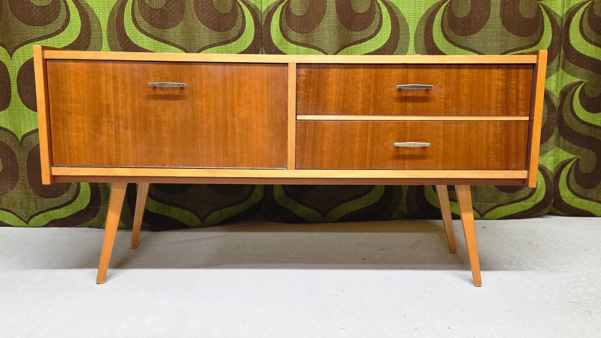 Small Scandinavian low sideboard 1960 vintage with tapered legs.