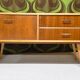 Small Scandinavian low sideboard 1960 vintage with tapered legs.